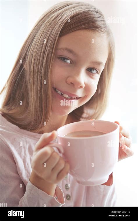 Years Old Girl Drinking Hot Cocoa From The Big Pink Cup Stock Photo