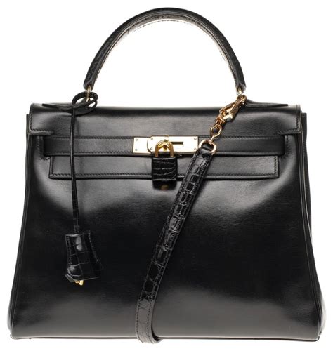 Superbe Customisation Hermès Kelly 28 retourné en cuir box noir avec