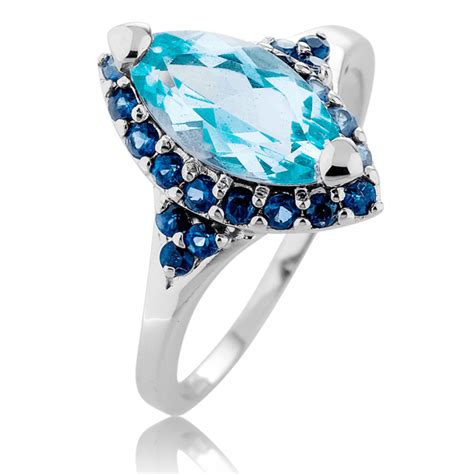 2cts Of Aquamarine And Sapphire In A 9ct White Gold Ring