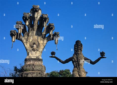 Giant Multi Headed Snake Or Naga Sculpture And Goddess With Offerings