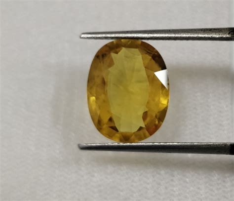 Oval Astrology Cg Bangkok Heated Yellow Sapphire Carat Cts At