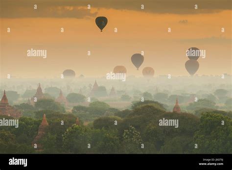 Hot Air Balloon Over Plain Of Bagan In Misty Morning Myanmar Stock Photo Alamy