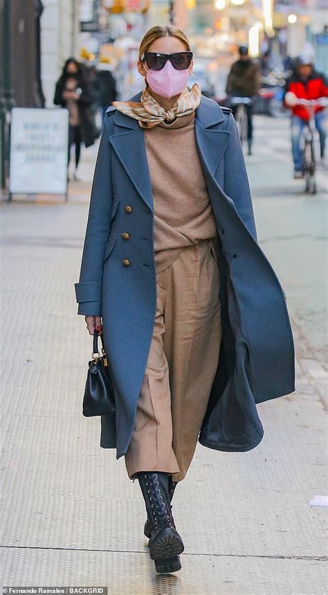 Olivia Palermo Pairs Camel Sweater And Culottes With Blue Coat In NYC