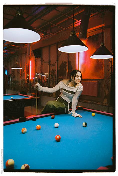 Woman Playing Pool Table Snooker Game By Stocksy Contributor Nikita