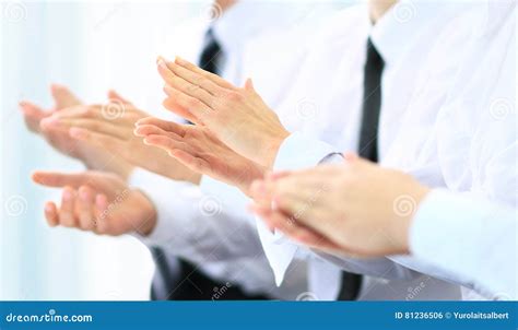 Business Group Of People Clapping Hands During A Meeting Stock Photo