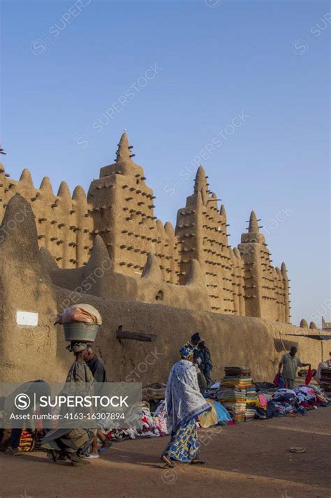 People Setting Up The Weekly Market In Front Of The Great Mosque Of