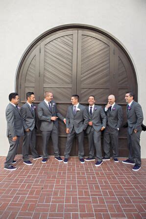 The Bridesmaids In Plum Bobbinet Dresses And Gray Converse