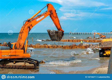 Construction of Breakwaters, Construction Equipment on the Sea Coast ...