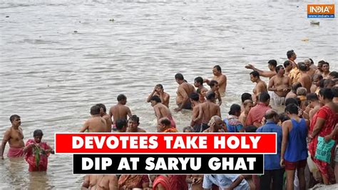 Devotees Takes Holy Dip At Saryu Ghat In Uttar Pradeshs Ayodhya On The