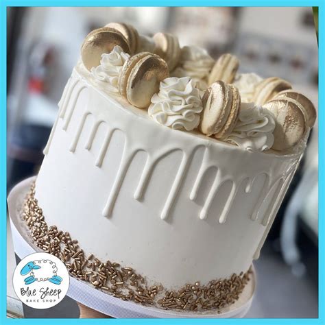 Pretty And Elegant White Buttercream Cake With White Chocolate Drip And