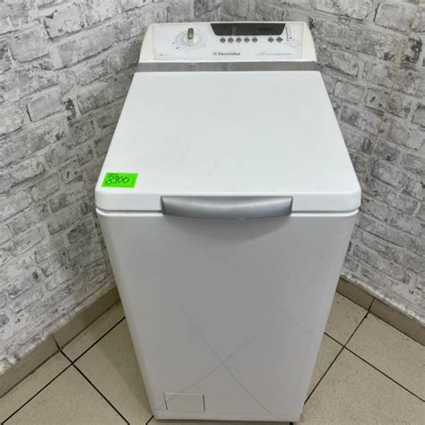 Electrolux EWT 1021 - Стиральные машины с вертикальной загрузкой