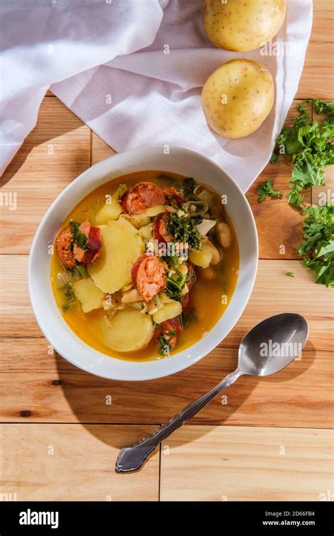 Traditional Portuguese Caldo Verde Linguica Sausage Soup With Kale And