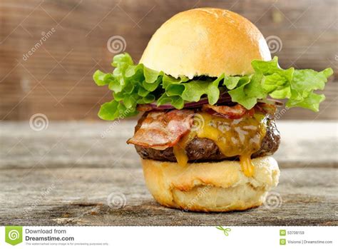 Gourmet Bacon Cheeseburger With Lettuce And Tomato Stock Image Image