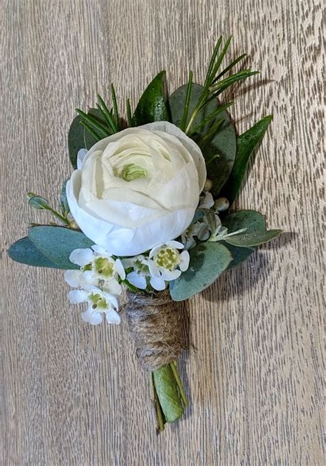 White Ranunculus Boutonniere En