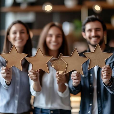photo  star review happy team holding stars customer satisfaction