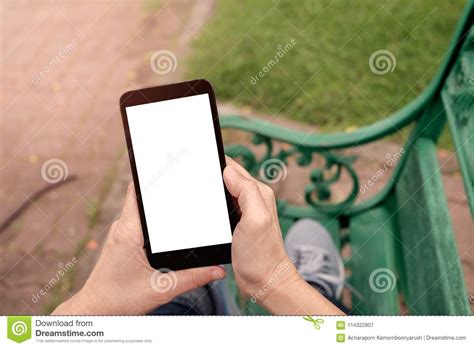 Hands Holding A Smartphone With White Screen Stock Image Image Of