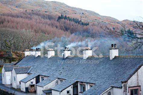 Smoking Chimneys In Cumbrian Cottages Stock Photo | Royalty-Free ...