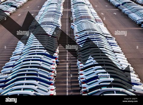 The concept of a decline in car production or prices. Manufacturing ...