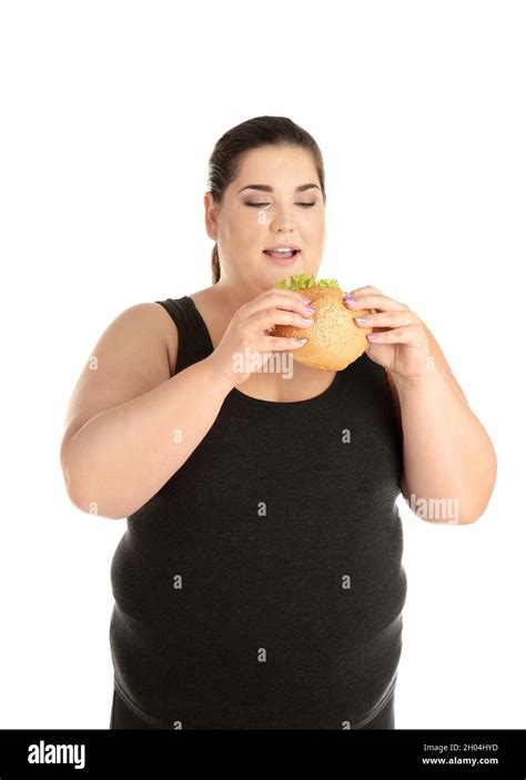 Overweight Woman With Hamburger On White Background Stock Photo Alamy