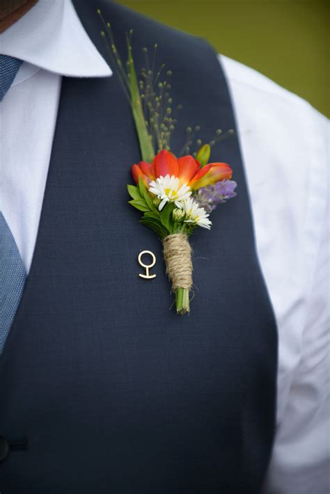 Wildflower Style Boutonniere With Freesia Lavender And Asters With A Partial Twine Stem Wrap