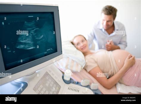 Pregnant Woman Doing Ultrasound At Clinic Stock Photo Alamy