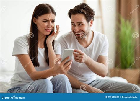 Jealous Husband Showing Cheating Wife Phone Accusing Of Infidelity