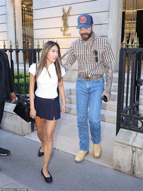 Post Malone shops at luxury fashion store with girlfriend Christy Lee