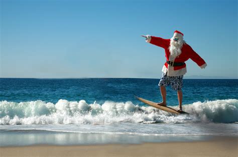 Hundreds Of Santas Surf On Floridas Space Coast On Christmas Eve