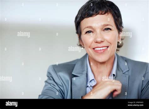 Successful Female Executive Smiling Portrait Of Successful Mature