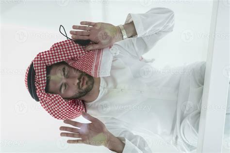 Muslim Man Doing Sujud Or Sajdah On The Glass Floor Stock