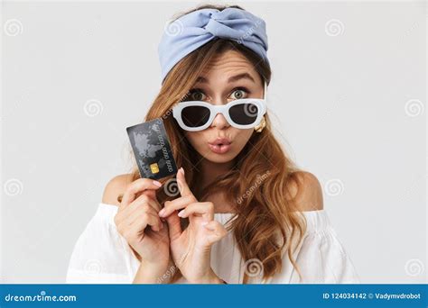 Image Of Attractive Stylish Girl 20s Wearing Sunglasses Demonstrating Credit Card Isolated Over