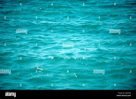 Texture Of Shining Sea Surface With Waves Beautiful Background