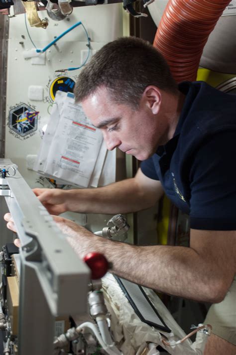 Chris Cassidy Works On A Spacesuit Nasa