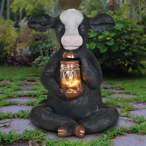 Amazon Exhart Solar Cow Garden Statue With LED Firefly Lights