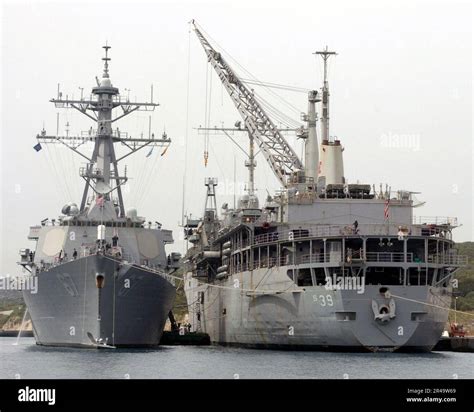 US Navy The Guided Missile Destroyer USS Cole DDG 67 Is Tied Up Along