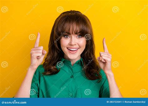 Photo Of Excited Impressed Lady Wear Green Shirt Pointing Two Fingers