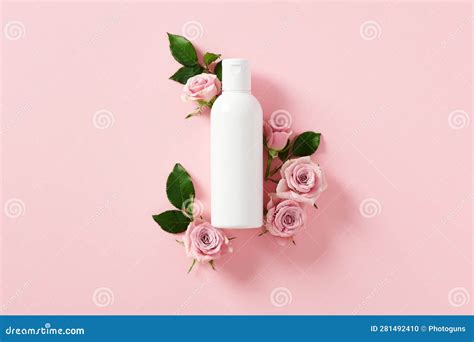 Blank White Shampoo Bottle With Rose Petals On Pink Background Shower