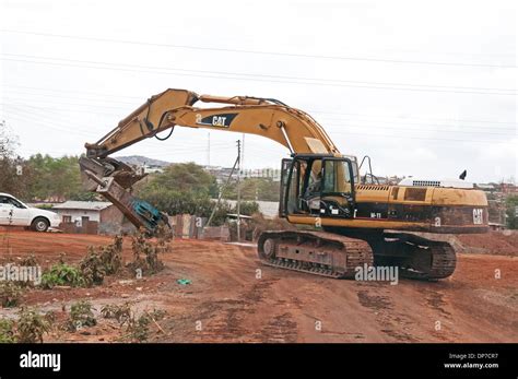 CAT Caterpillar Hydraulic Excavator Lifting Equipment Working On Road