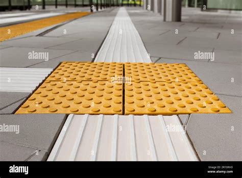 Tiles With Tactile Ground Surface Indicators Closeup View Stock Photo