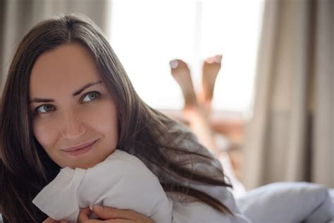 Premium Photo Large Frontal Portrait Of One Young Woman In Bed Early