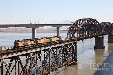 Union Pacific Locomotive Trains Riding Atop The Old Benicia Martinez