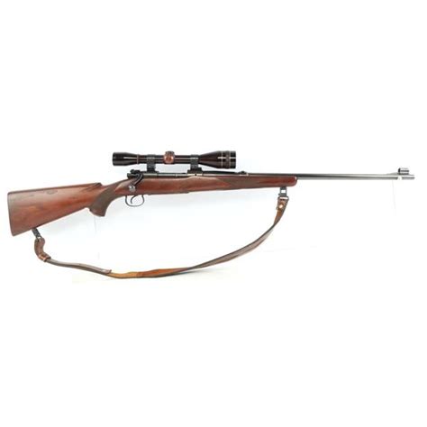 WINCHESTER MODEL 54 RIFLE WITH LEUPOLD SCOPE