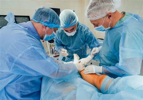 Process Of Trauma Surgery Operation Group Of Surgeons In Operating