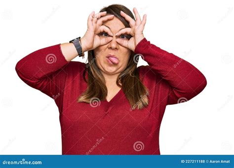 Beautiful Brunette Plus Size Woman Wearing Casual Clothes Doing Ok Gesture Like Binoculars