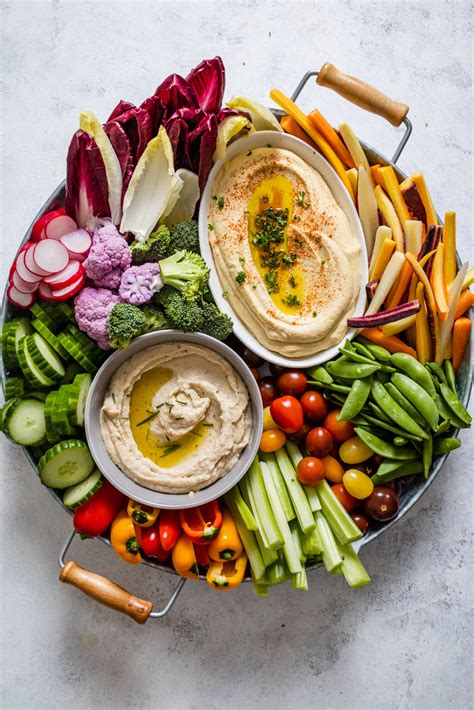 Creamy Hummus And White Bean Dip With Roasted Garlic And Rosemary Olive And Mango