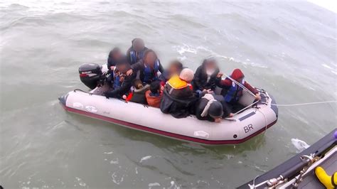 RNLI release dramatic bodycam footage of migrant Channel rescue for first time - as boss defends ...