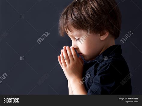 Little Boy Praying Image And Photo Free Trial Bigstock