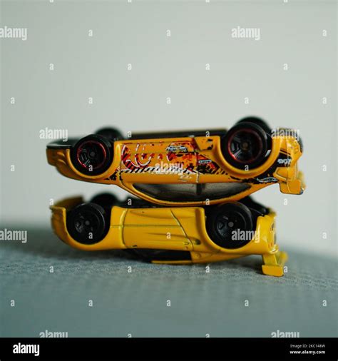 Mattel Hot Wheels Toy Model Ford Focus Laying Upside Down On A Lotus Car Stock Photo Alamy
