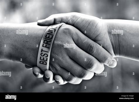 Human hands of two friends shaking hands Stock Photo - Alamy