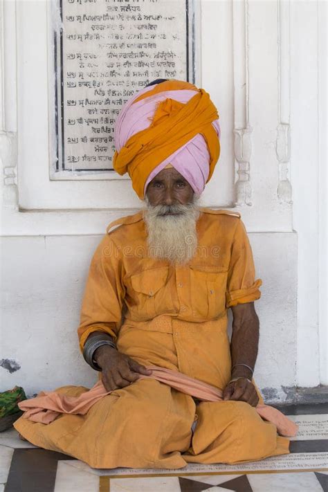 Sikh Man Visiting The Golden Temple In Amritsar Punjab India